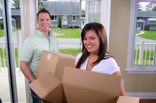 Professional movers handling a flat removal in a Notting Hill period property
