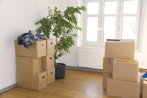 Labelled moving boxes ready for a flat or office move in Notting Hill