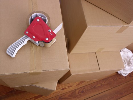 Removal vehicle and moving boxes prepared for a Notting Hill relocation