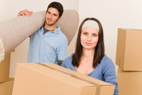 Careful furniture handling during a house move in Notting Hill