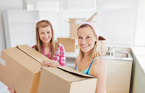 Moving van and packed boxes outside a Notting Hill property